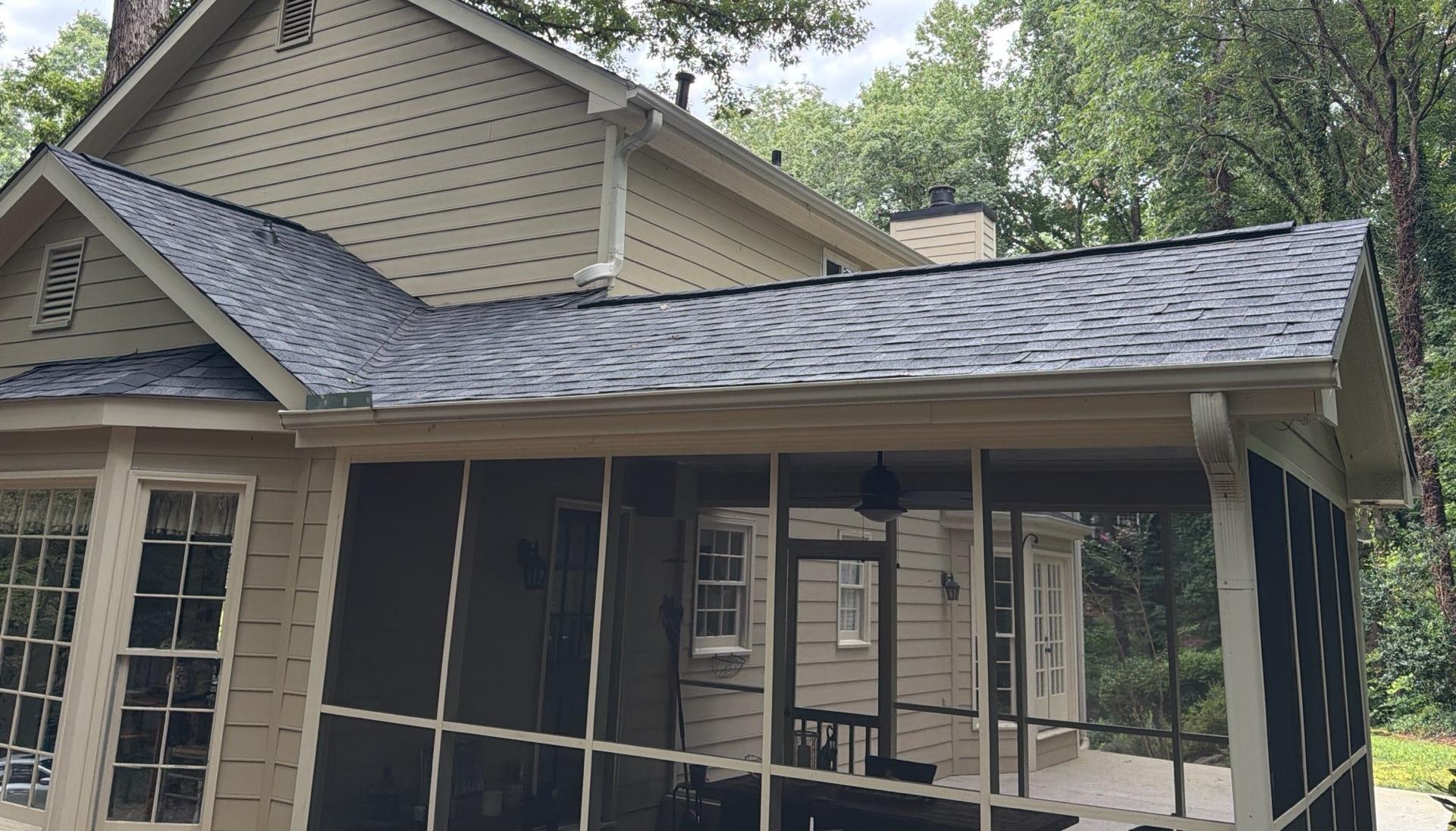 New architectural shingles over the screened porch roof in Roswell GA