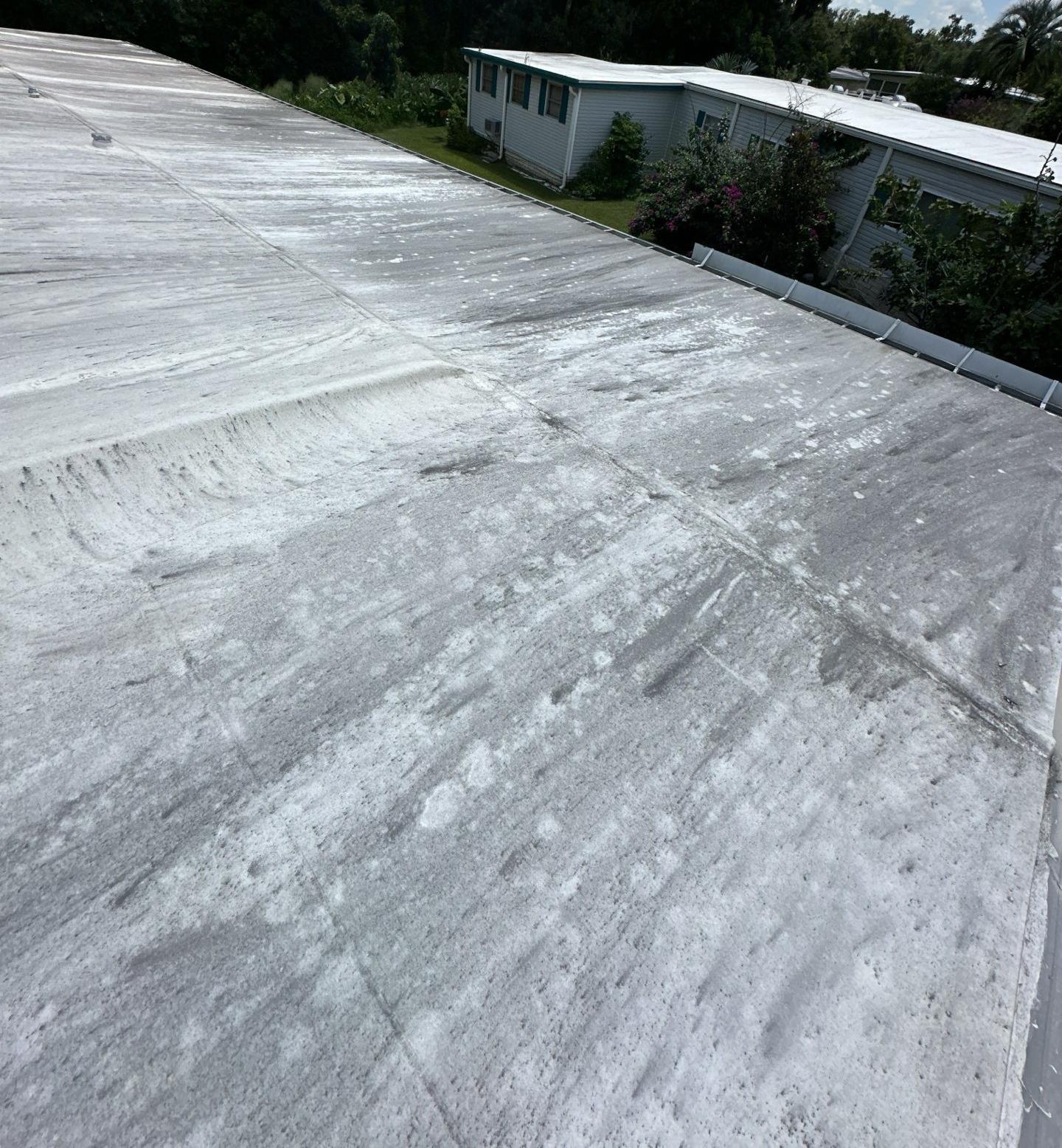 Ridges and stains where water sat on the old roof in Dade City FL