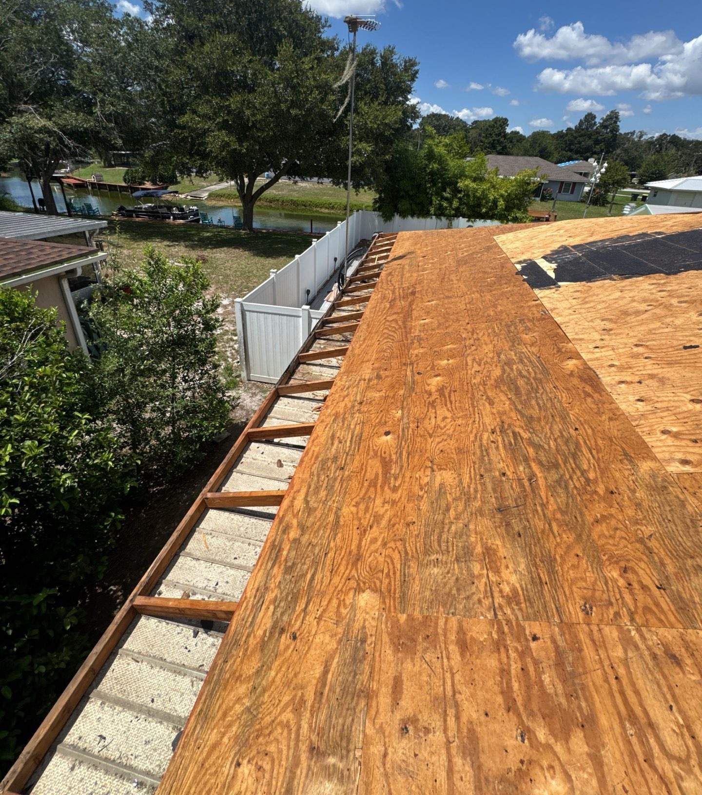 Roof deck exposed after the shingle tear-off in Lake Wales FL