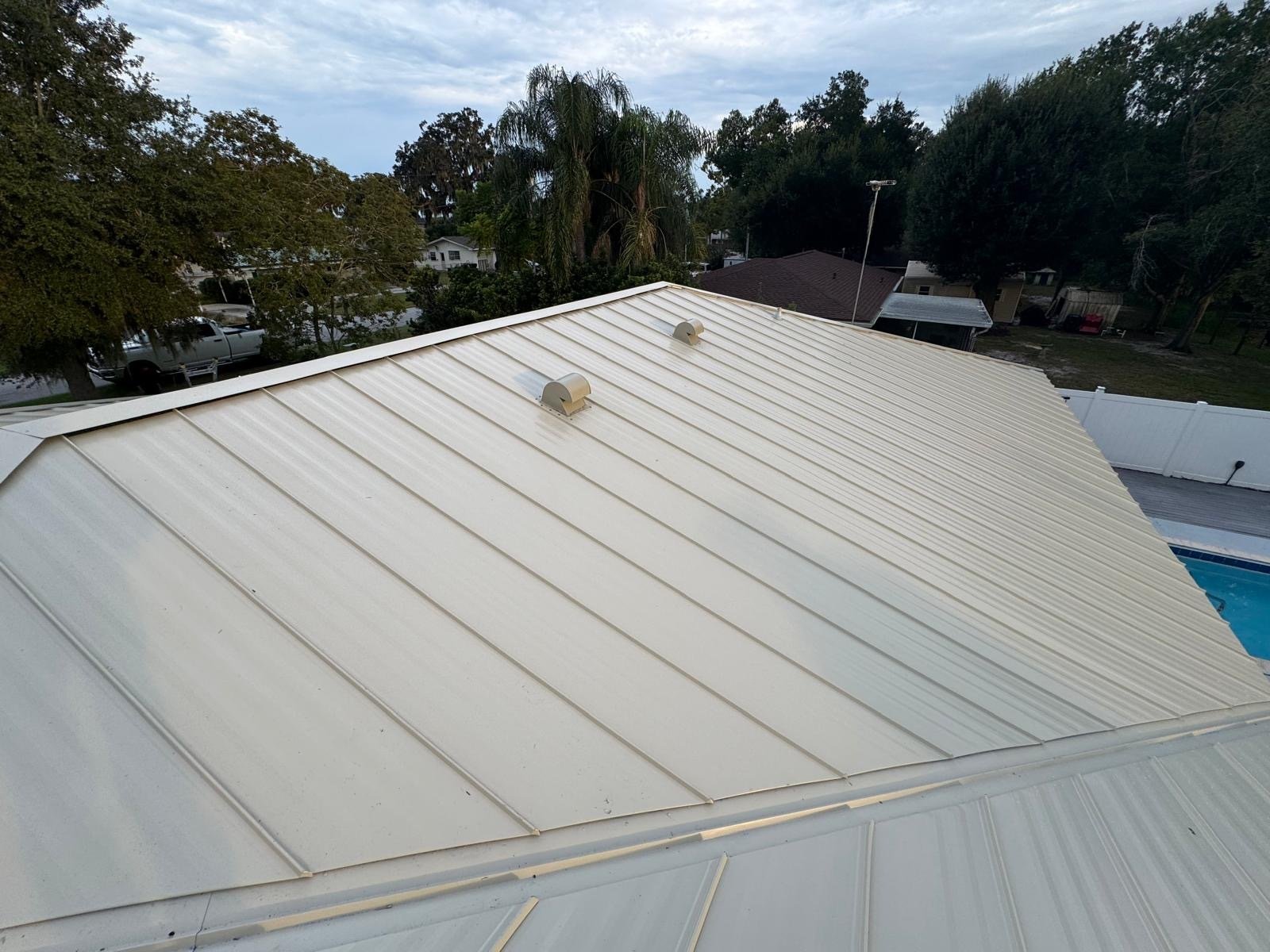 New standing seam metal panels with vents on a Lake Wales FL home