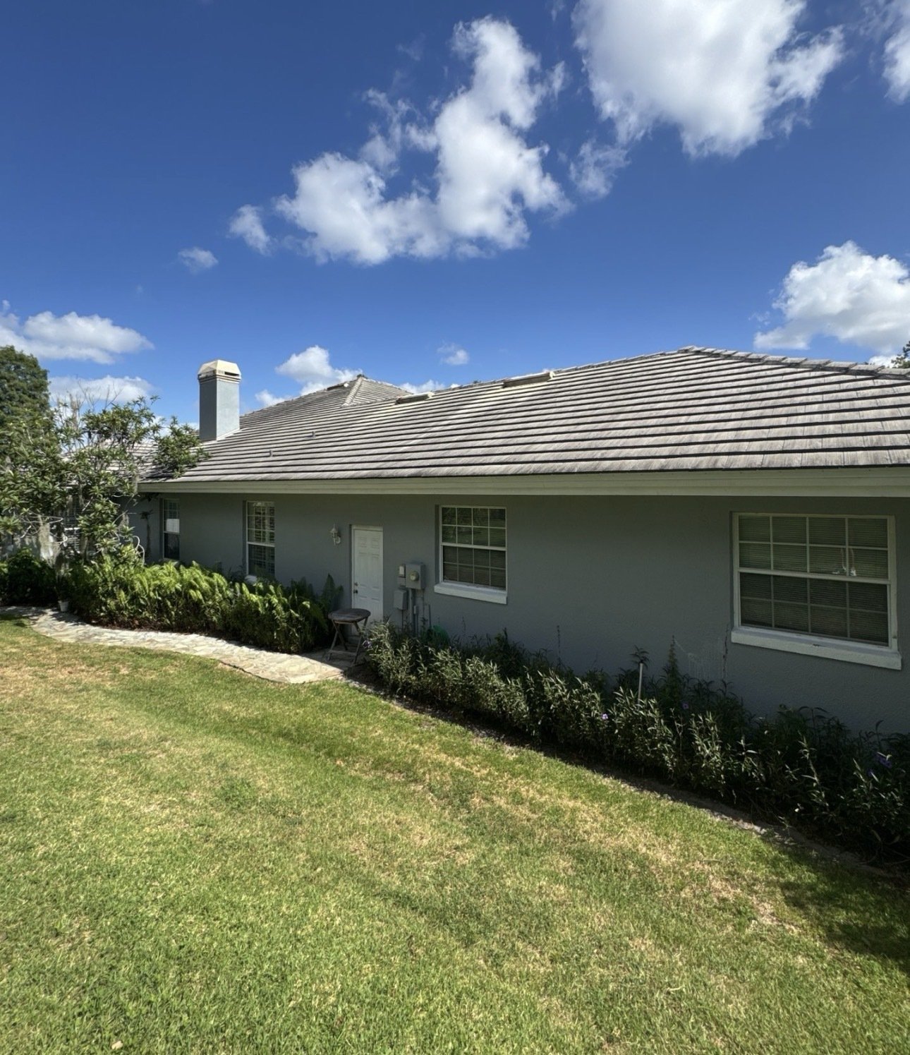 Weathered tile roof on the back of the Lakeland FL home