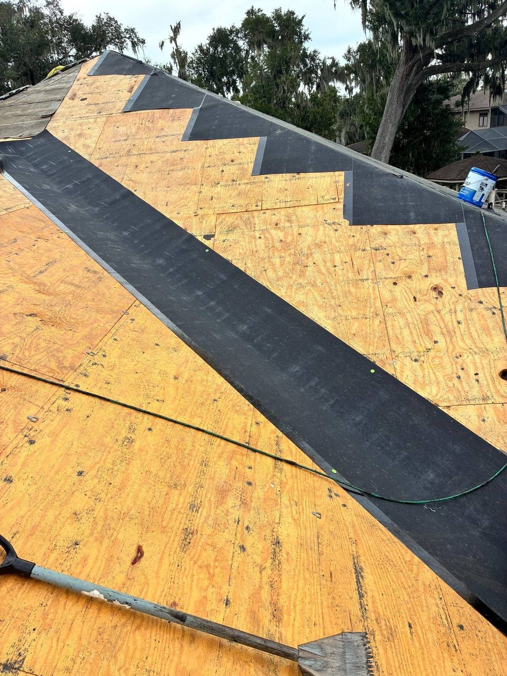 Ice and water shield down a valley over the bare deck in Lakeland FL